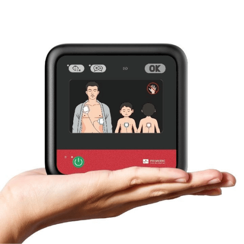 Primedic HeartSave myPAD 670A portable defibrillator held in one hand
