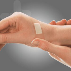 AeroPlast plastic bandaid strip applied to the forearm